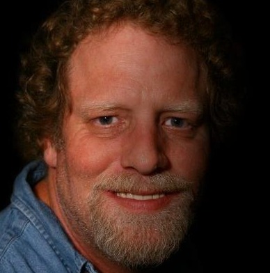 Portrait of author R. E. Tackett